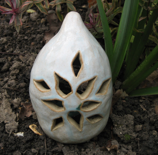 Candle holder for the garden.